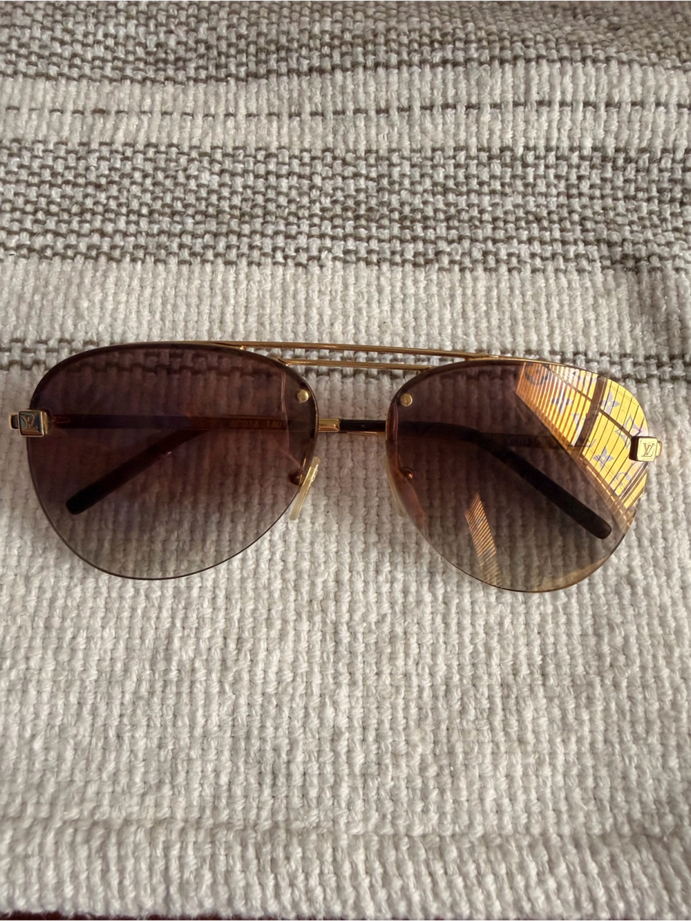 Louis Vuitton clockwise gold aviator sunglasses
